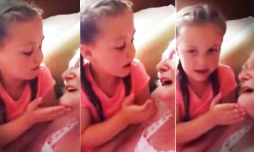 Una bambina canta per la nonna malata di demenza