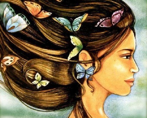 Donna con farfalle nei capelli