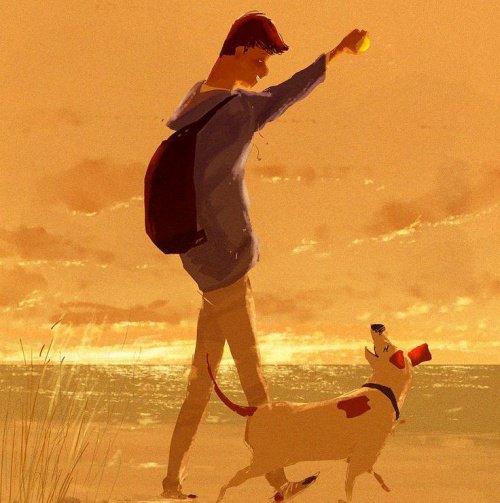 ragazzo con il cane sulla spiaggia