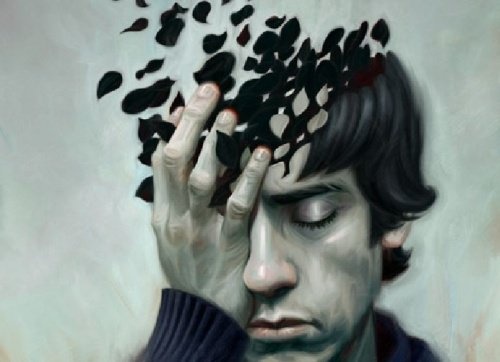 Uomo con una mano sul viso