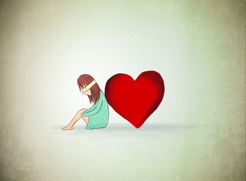 ragazza con benda sugli occhi e cuore