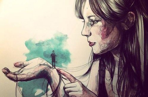 Donna con uomo piccolo sulla mano autostima