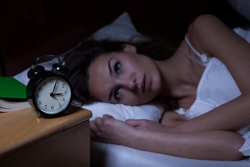Donna con insonnia