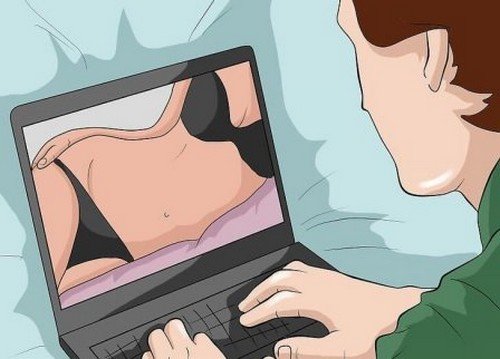 Uomo fa uso di pornografia