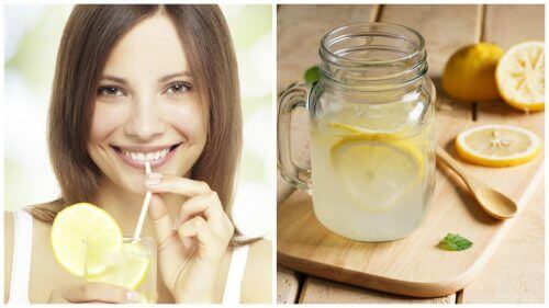 Donna che beve succo di limone