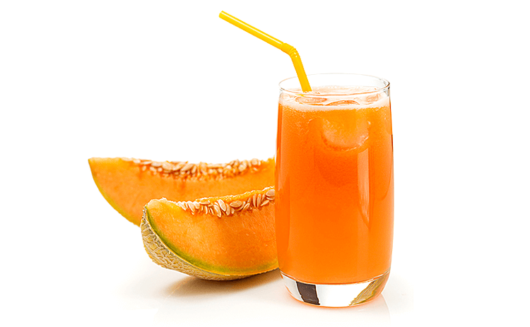 Bicchiere con succo di melone e fette di melone